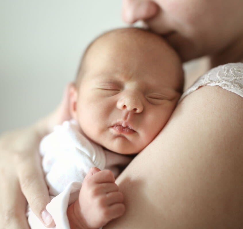 a close up of a newborn child